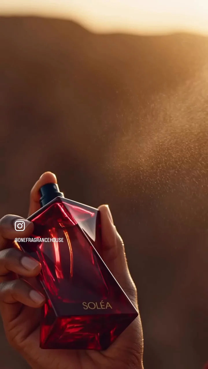 SOLÉA's red bottle in warm sunset light